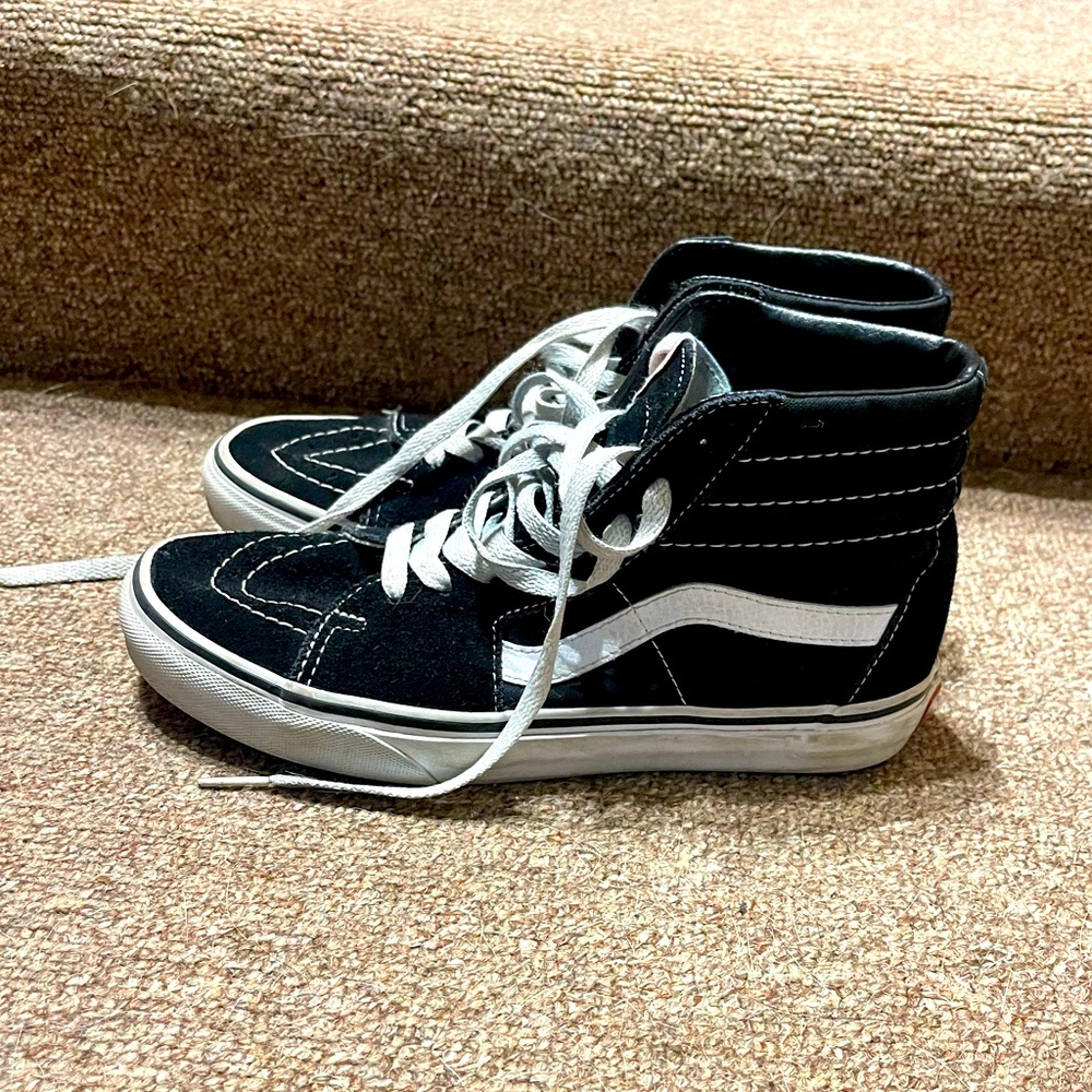 Woman’s high top vans
